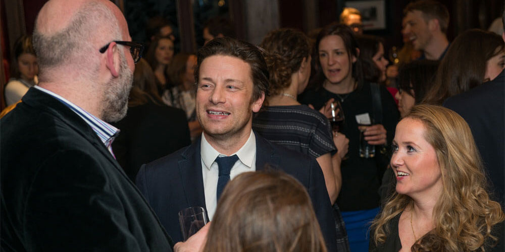 Celebrity Chef Jamie Oliver mingles with guests at the annual André Simon Awards
