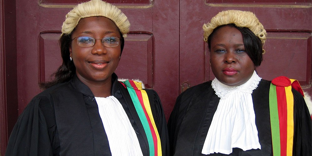 Two female lawyers from Cameroon in full legal attire